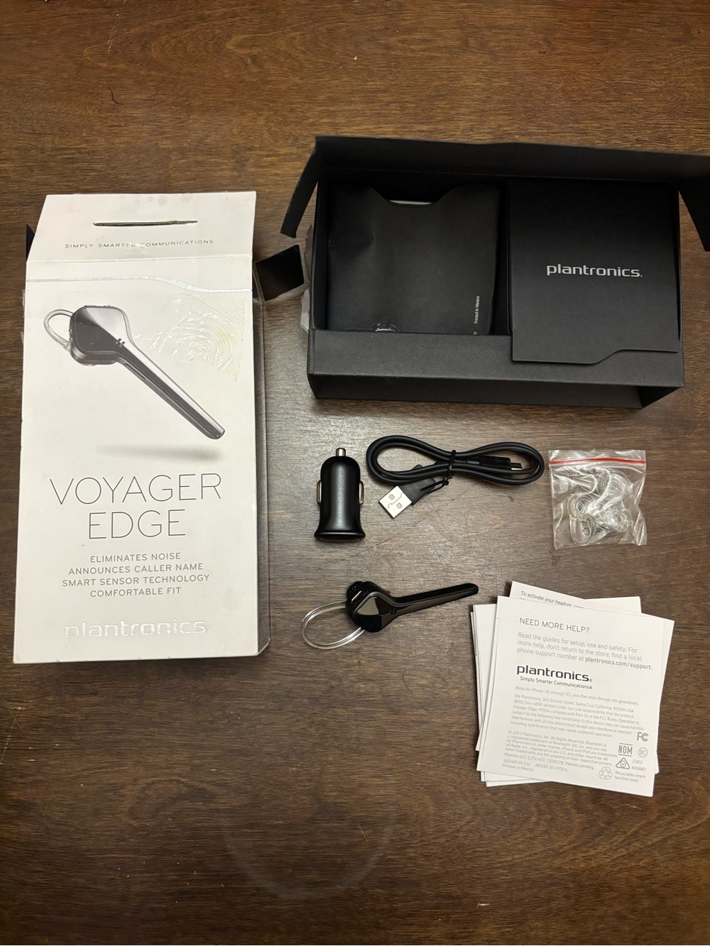 Plantronics Voyager Edge Bluetooth Headset,new w/ car charger,micro USB cable.